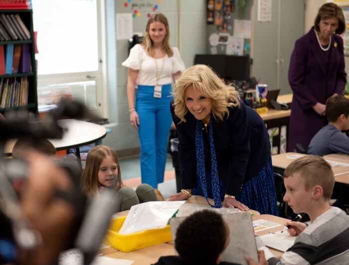First lady Jill Biden speaks to Amber Farkas, a third-grade teacher at Beverly Gardens Elementary School in Riverside, Ohio.