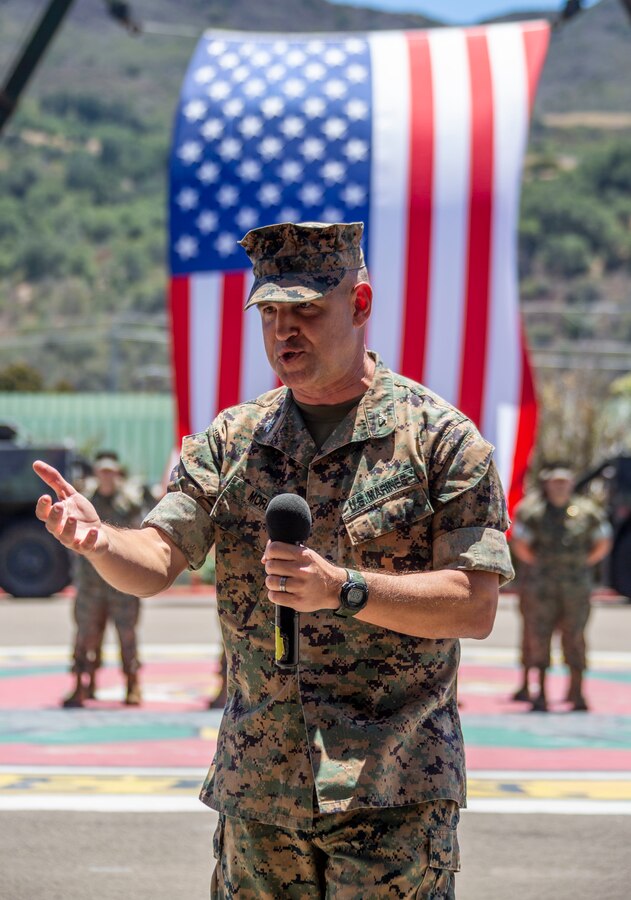 U.S. Marine Corps Col. Coby Moran, the outgoing commanding officer of the School of Infantry - West, delivers a speech during a change of command ceremony at SOI-West on Marine Corps Base Camp Pendleton, California, June 24, 2022. During the ceremony, Moran relinquished command of SOI-West to Col. Seth MacCutcheon. Moran is a native of Seattle. (U.S. Marine Corps photo by Cpl. Alison Dostie)