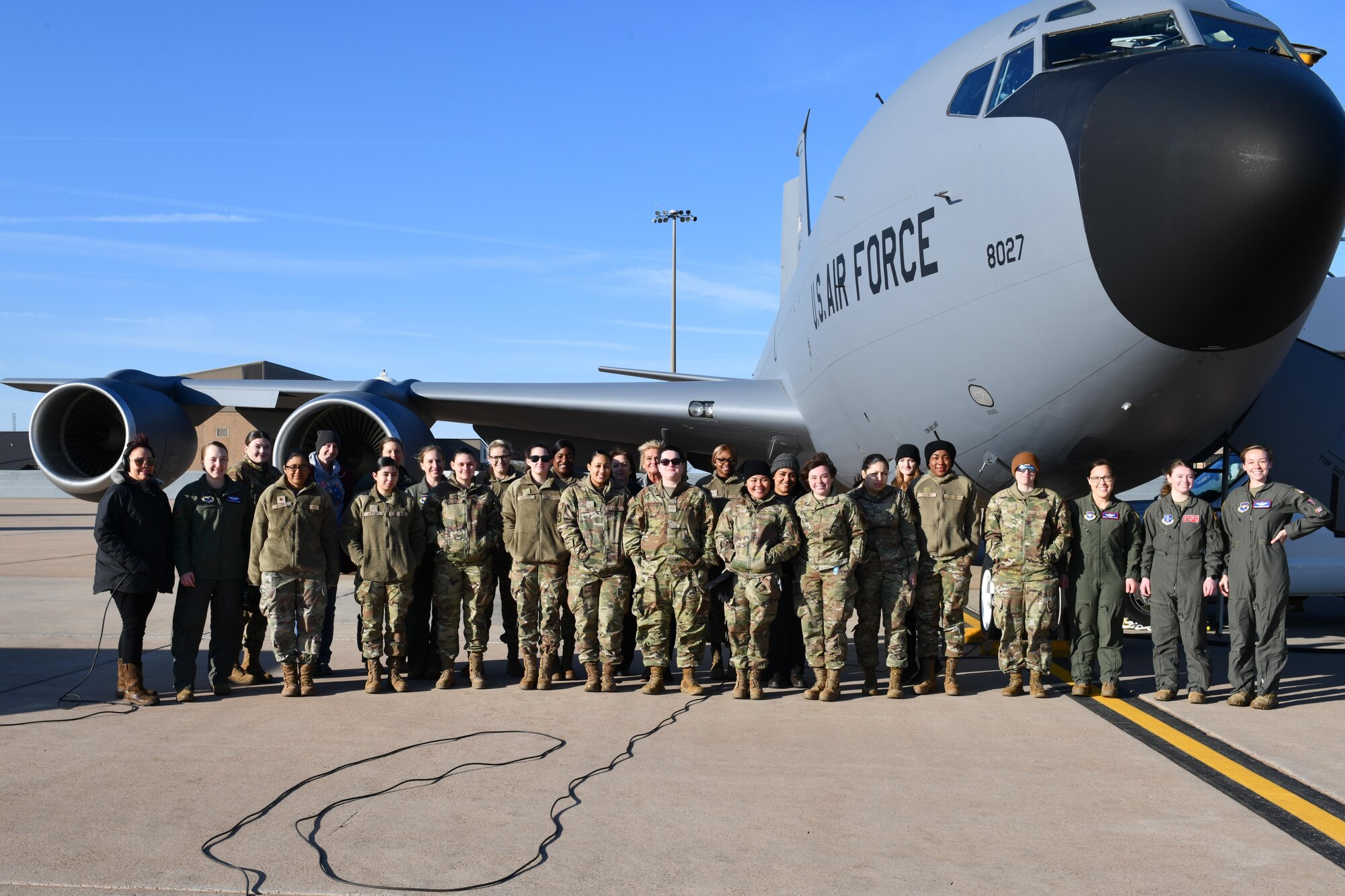 Female Airmen from the 97th Air Mobility Wing pose for a photo in front of a KC-135 Stratotanker at Altus Air Force Base, Oklahoma, March 28, 2023. Women make up more than 20 percent of the total enlisted force. (U.S. Air Force photo by Airman 1st Class Miyah Gray)