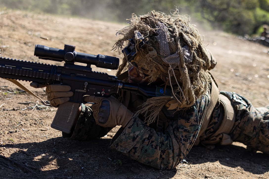A U.S. Marine with Infantry Marine Course 2-23, Infantry Training Battalion, School of Infantry-West, engages targets during a fire and maneuver range at Marine Corps Base Camp Pendleton, California, Jan. 24, 2023. IMC is the Marine Corps’ 14-week entry-level training course for enlisted infantry Marines. (U.S. Marine Corps photo by Cpl. Willow Marshall)