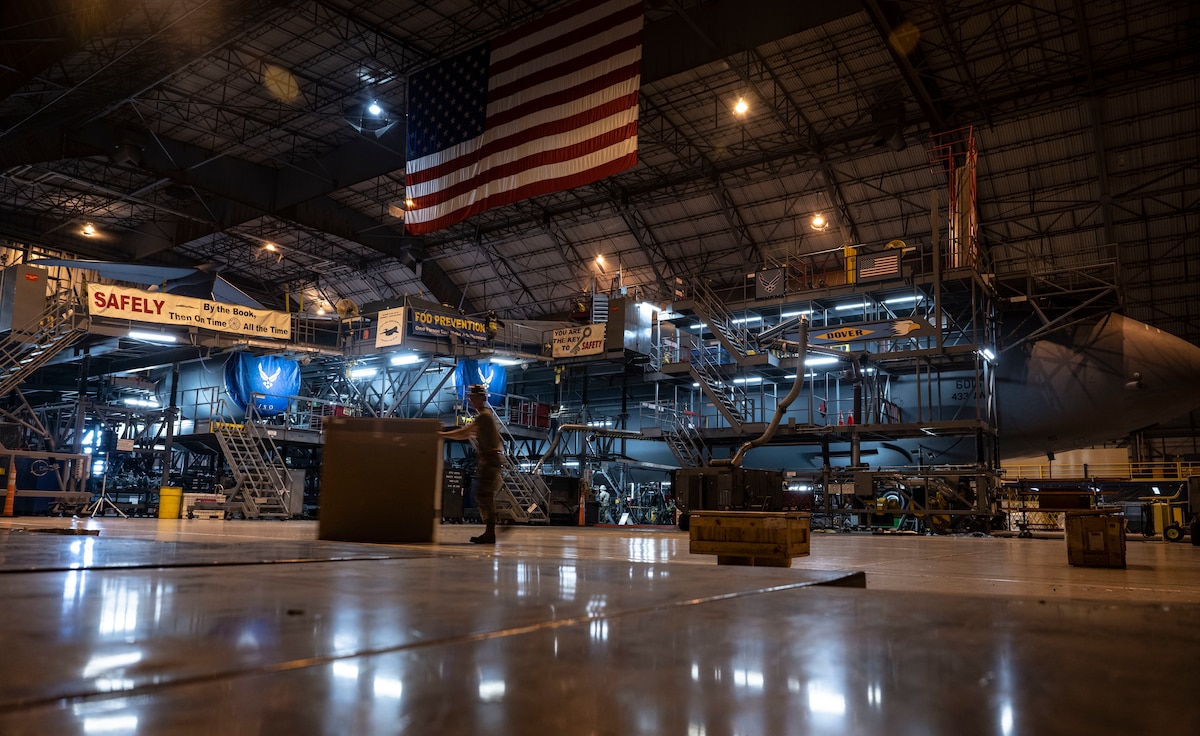 Airmen from the 512th and 436th Maintenance Squadrons perform maintenance on a C-5M Super Galaxy at the 436th MXS Isochronal Dock on Dover Air Force Base, Delaware, March 28, 2023. The 436th MXS Isochronal Dock is capable of performing certain Programmed Depot Maintenance-level jobs, effectively minimizing maintenance downtime and increasing aircraft availability. (U.S. Air Force photo by Staff Sgt. Marco Gomez)