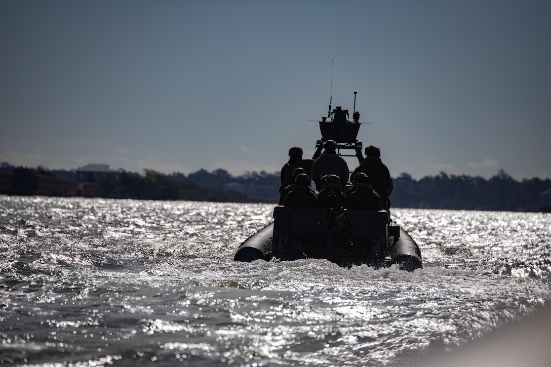 U.S. Marines with Charlie Company, Battalion Landing Team 1/6, 26th Marine Expeditionary Unit conduct boat patrols during a littoral movement as part of MEU Exercise III on Camp Lejeune, North Carolina, March 11, 2023. BLT 1/6 continues to enhance rigid-hulled inflatable boat readiness through conducting on and off and shore to shore drills prior to deployment. The 11m RHIBs provide a high-speed, long –range, low-signature combatant craft capable of projecting and recovering Marines for a variety of missions