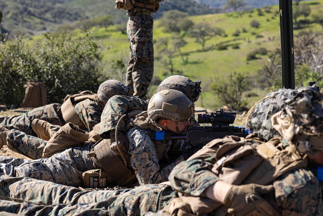 U.S. Marine, Cpl. Anthony Nikac, a lateral move student with Infantry Marine Course 2-23, Infantry Training Battalion, School of Infantry-West, suppresses an enemy position with a M240B medium machine gun during a fire and maneuver range at Marine Corps Base Camp Pendleton, California, Jan. 24, 2023. IMC is the Marine Corps’ 14-week entry-level training course for enlisted infantry Marines. Nikac is a native of New York City. (U.S. Marine Corps photo by Cpl. Willow Marshall)