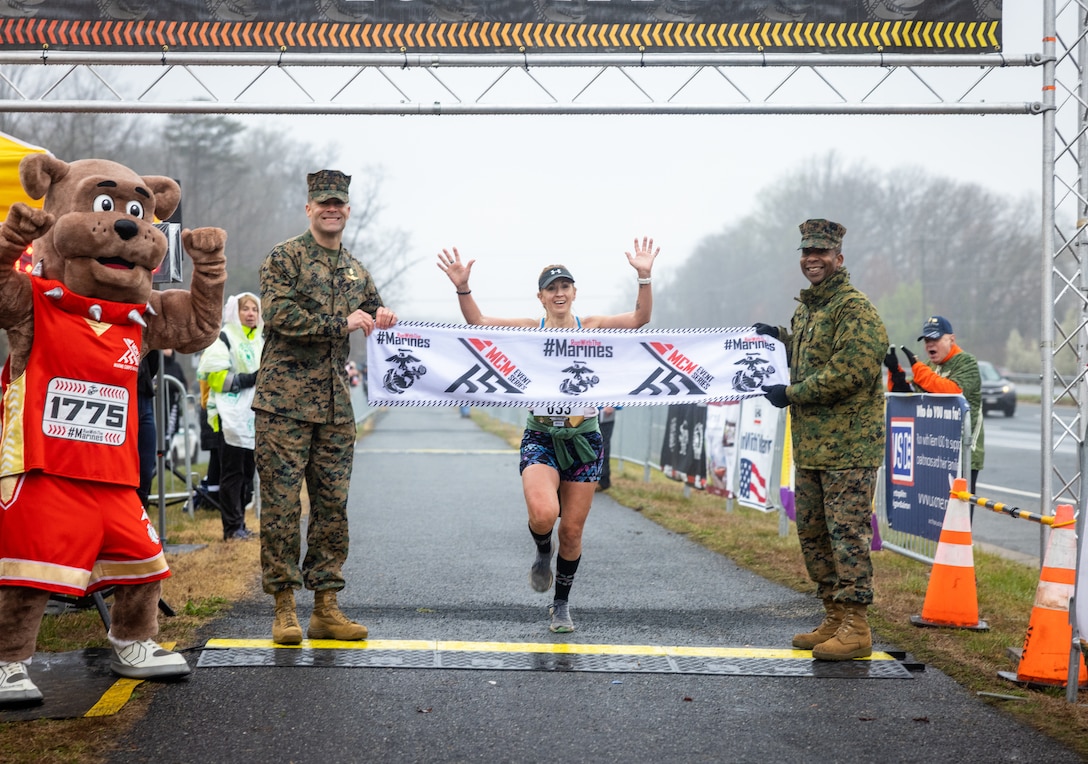 Erin-Kate Aleksak crosses the finish line of the Marine Corps Marathon 17.75k at Prince William Forest
Park, Virginia, March 25, 2023. The 17.75k distance commemorates the year the Marine Corps was
established and offers finishers “Access Granted” passes, granting them guaranteed access into the 48th
MCM. (U.S. Marine Corps photo by Lance Cpl. Joaquin Dela Torre)