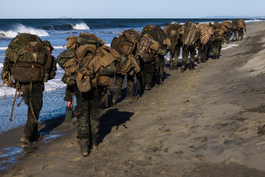 U.S. Marines with Infantry Marine Course 1-23, Infantry Training Battalion, School of Infantry - West, begin a five-day final exercise covering 65 km after an amphibious insert on Marine Corps Base Camp Pendleton, California, Jan. 23, 2023. IMC is the Marine Corps’ 14-week infantry training course designed to make better trained and more lethal entry-level Marines. (U.S. Marine Corps photo by Lance Cpl. Earik Barton)