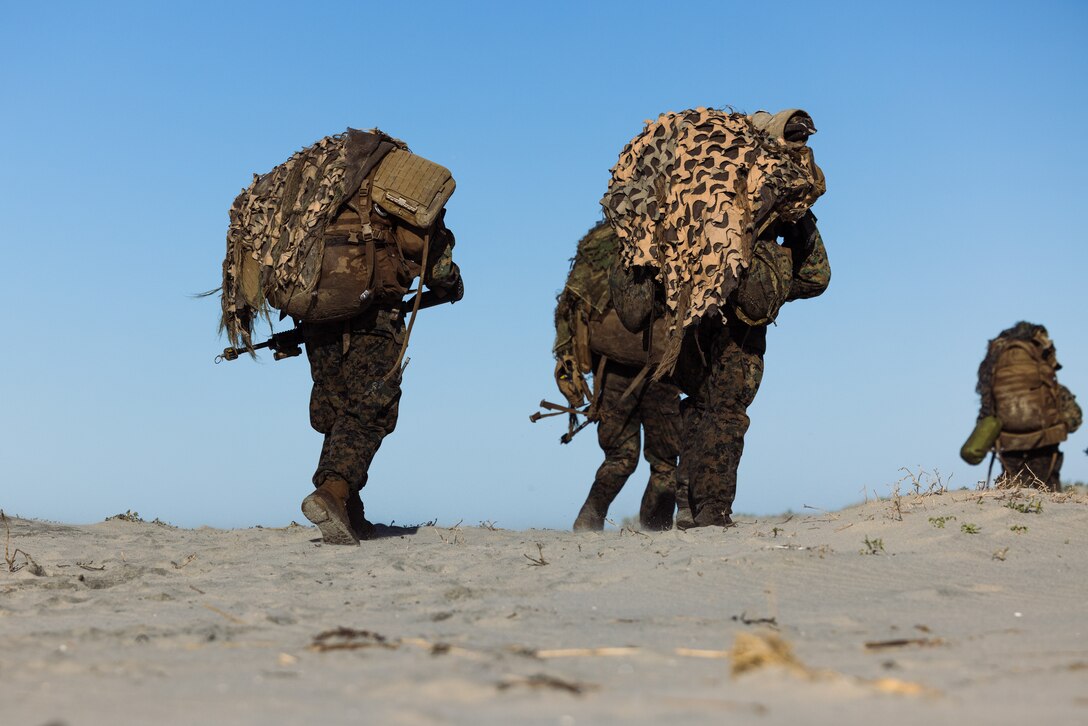 U.S. Marines with Infantry Marine Course 1-23, Infantry Training Battalion, School of Infantry - West, begin a five-day final exercise covering 65 km after an amphibious insert at the Del Mar Boat Basin on Marine Corps Base Camp Pendleton, California, Jan. 23, 2023. IMC is the Marine Corps’ 14-week infantry training course designed to make better trained and more lethal entry-level Marines. (U.S. Marine Corps photo by Lance Cpl. Earik Barton)