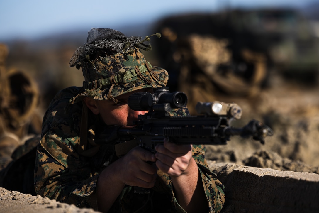 U.S. Marine Pfc. Luke Newcomb, a student with Infantry Marine Course 1-23, Infantry Training Battalion, School of Infantry - West, posts security during the final training exercise on Marine Corps Base Camp Pendleton, California, Jan. 23, 2023. IMC is the Marine Corps’ 14-week infantry training course designed to make better trained and more lethal entry-level Marines. (U.S. Marine Corps photo by Lance Cpl. Earik Barton)
