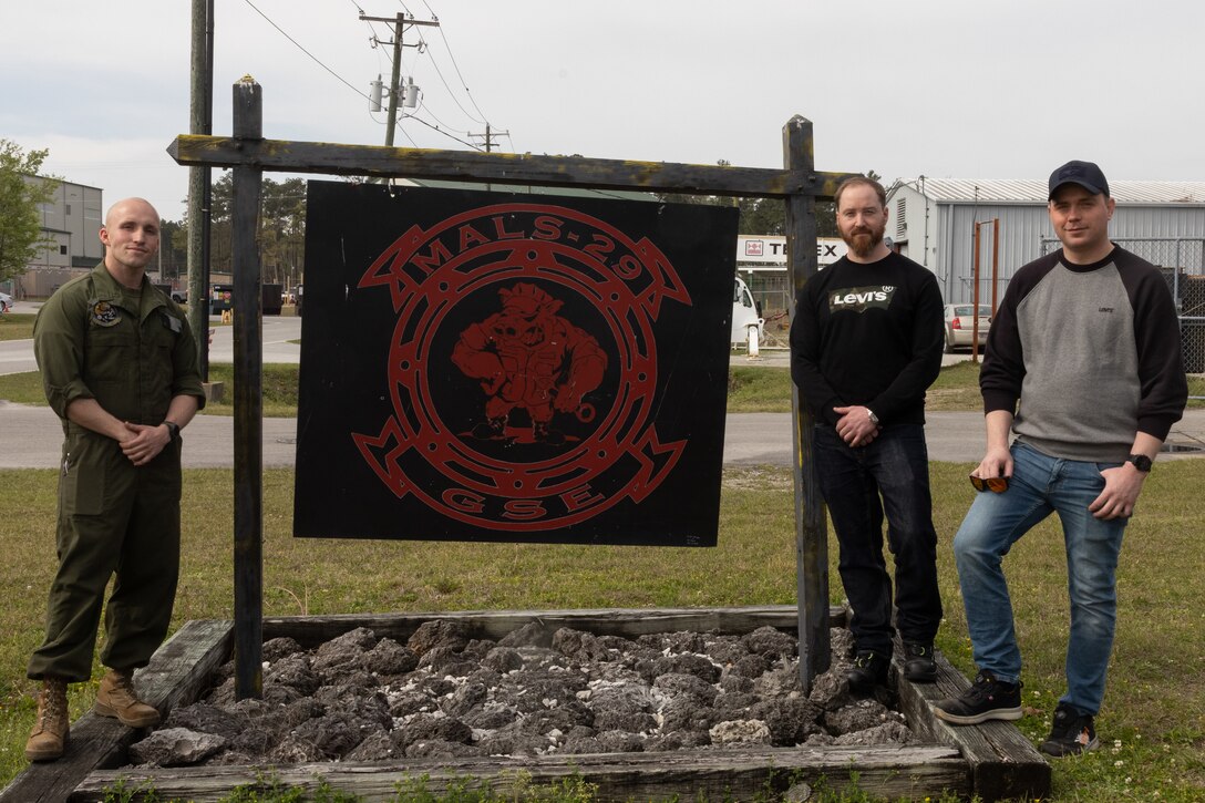 U.S. Marine Corps Sgt. Bryan Garofolo, left, a ground-support equipment mechanic with Marine Aviation Logistics Squadron (MALS) 26, and Norwegian GSE technicians with the Marine Corps Prepositioning Program-Norway pose for a photo at Marine Corps Air Station New River, North Carolina, March 28, 2023. Marines with MALS-26 trained with Norwegian GSE technicians to become certified as collateral-duty inspectors and increase interoperability with NATO allies and partners. MALS-26 is a subordinate unit of 2nd Marine Aircraft Wing, the aviation combat element of II Marine Expeditionary Force. (U.S. Marine Corps photo by Lance Cpl. Orlanys Diaz Figueroa)