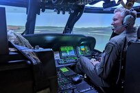 Col. Antanas Matutis, commander of the Lithuanian Air Force, receives an orientation and test drive of the Blackhawk Aircrew Trainer, a state-of-the-art rotary wing pilot simulator, at the Eastern Army National Guard Aviation Training Site at Fort Indiantown Gap, Pa., on March 23, 2023. (U.S. Air National Guard photo by Capt. Nathaniel Curtis)