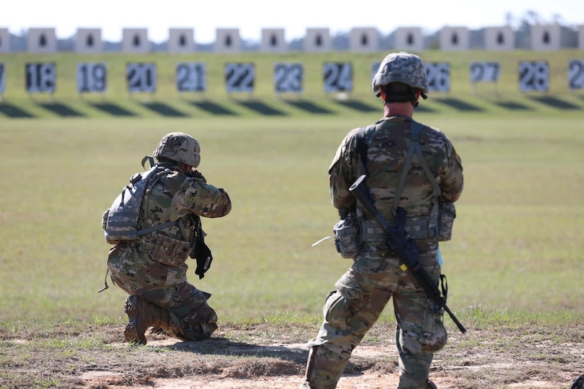 Sgt. 1st Class Justin Bovie, 84th Training Command operations cell, stands watch during the rifle matches at the ALL-ARMY at Fort Benning, Ga.