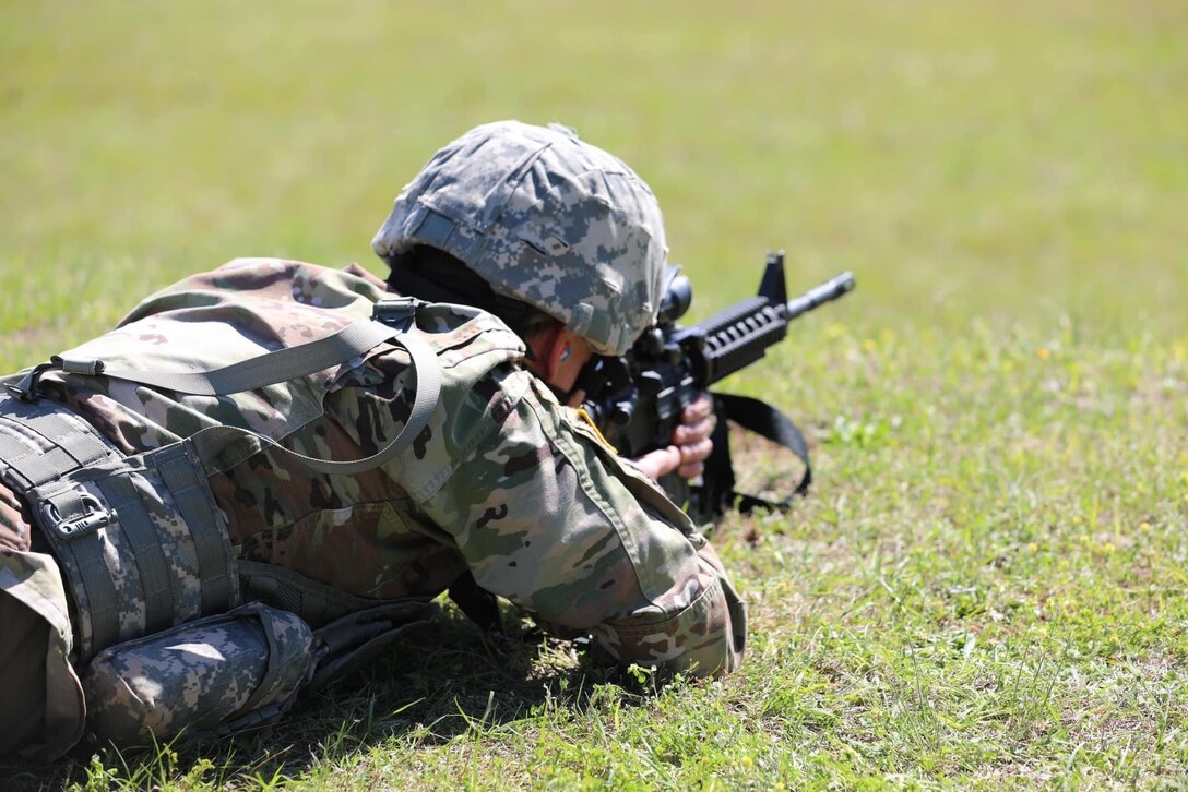 Sgt. 1st Class Justin Bovie takes aim at a 300 meter target during the ALL-ARMY Small Arms Competition at Fort Benning, Ga.