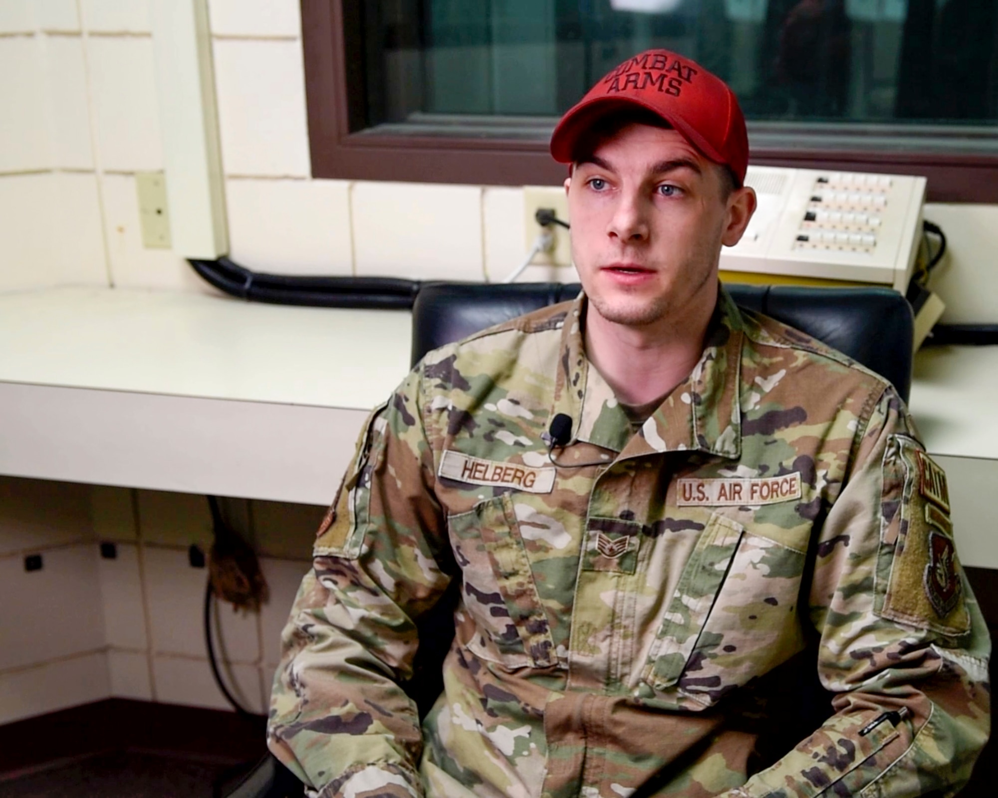 U.S. Air Force Staff Sgt. Kyle Helberg, a combat arms specialist assigned to the 673d Security Forces Squadron, Joint Base Elmendorf-Richardson, Alaska, gives his account of a recent helicopter crash in Talkeetna, Alaska, March 2, 2023. Helberg performed life-saving skills on a U.S. Army pilot after his helicopter crash-landed in Talkeetna immediately after takeoff, and was able to assist him in a quick recovery. (U.S. Air Force photo by Airman 1st Class Moises Vasquez)