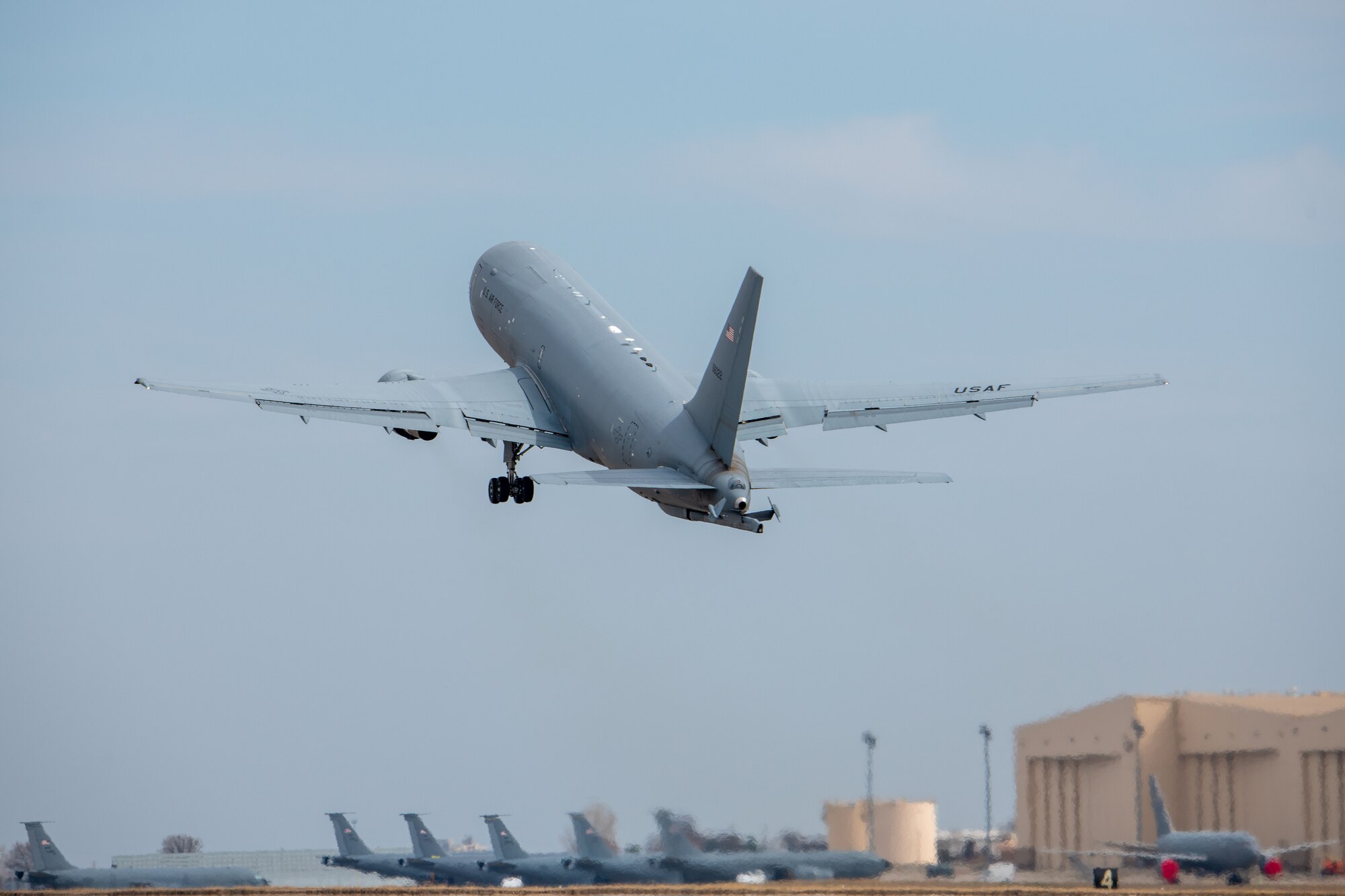 A KC-46A Pegasus takes off during Exercise Lethal Pride March 27, 2023, at McConnell Air Force Base, Kansas. Aircrews from the 22nd Air Refueling Wing and the 931st Air Refueling Wing performed an elephant walk and aircraft flush as part of the exercise. (U.S. Air Force Photo by Airman Gavin Hameed)