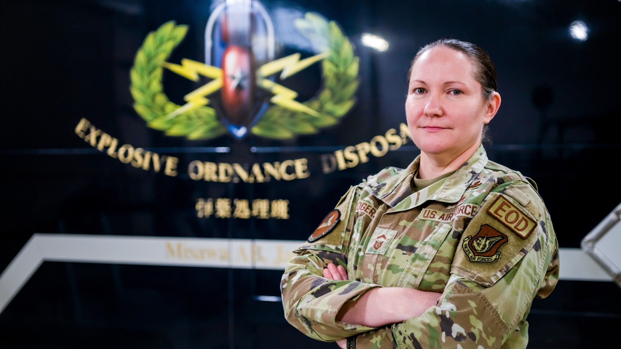 U.S. Air Force Senior Master Sgt. Diana Rogers, 35th Civil Engineer Squadron, Explosive Ordnance Disposal (EOD) superintendent, poses in front of a utility vehicle at Misawa Air Base, Japan, March 31, 2023. Rogers was selected for promotion to chief master sergeant, becoming the first female E-9 in the EOD career field in over 30 years. (U.S. Air Force photo by Staff Sgt. Kristen Heller)