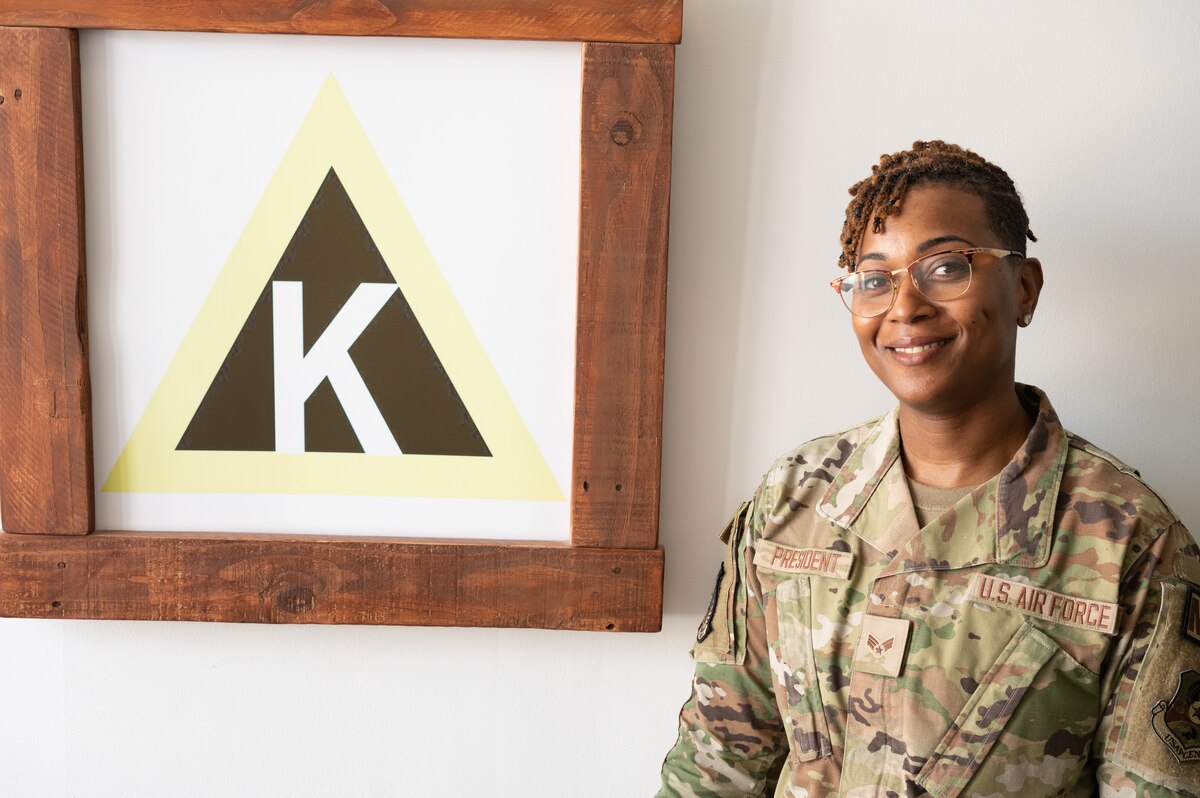 A U.S. Airman posing for a photo at Al Udeid Air Base.