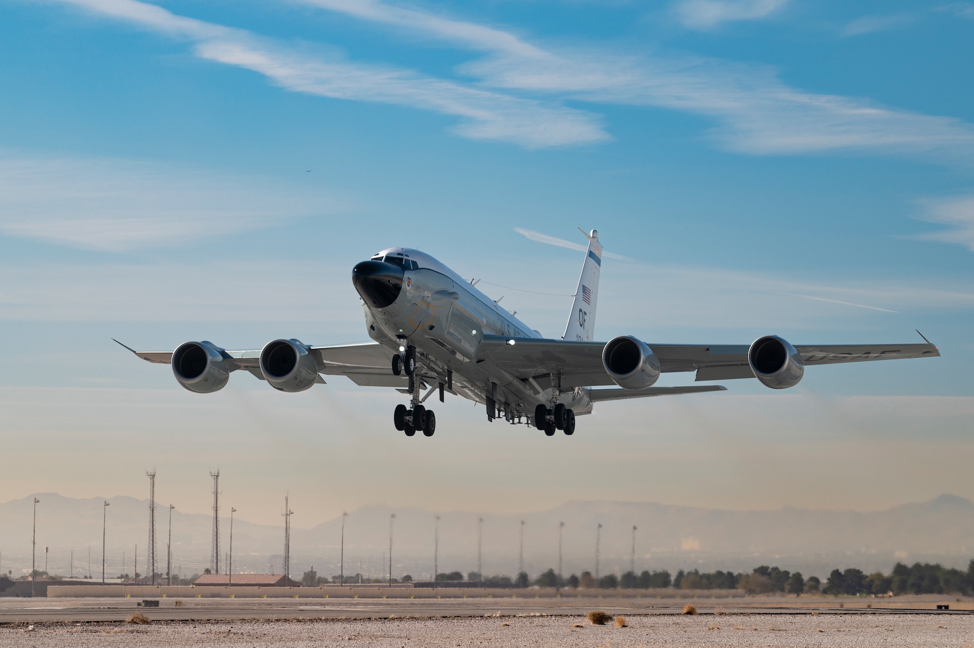 An RC-135 Rivet Joint reconnaissance aircraft assigned to the 55th Wing, Offutt Air Force Base, Nebraska, takes-off for a Weapons School Integration (WSINT) mission at Nellis Air Force Base, Nevada, Nov. 21, 2022. The RC-135V/W Rivet Joint reconnaissance aircraft supports theater and national level consumers with near real time on-scene intelligence collection, analysis and dissemination capabilities. (U.S. Air Force photo by William R. Lewis)