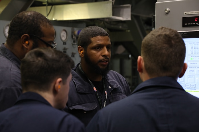 Fred Spaulding, a Naval Surface Warfare Center, Philadelphia Division Land Based Engineering Site (LBES) instructor and course developer, guides Sailors attached to USS Jack H Lucas (PCU 125) on how to operate a 9160 Gas Turbine Engine by using the Engineering Operational Sequencing System (EOSS) at NSWCPD on Jan. 17, 2023. PCU 125 will be the first Flight III Arleigh Burke class guided missile destroyer and is set to be commissioned later this year. (U.S. Navy photo by Sgt. Jermaine Sullivan/Released)