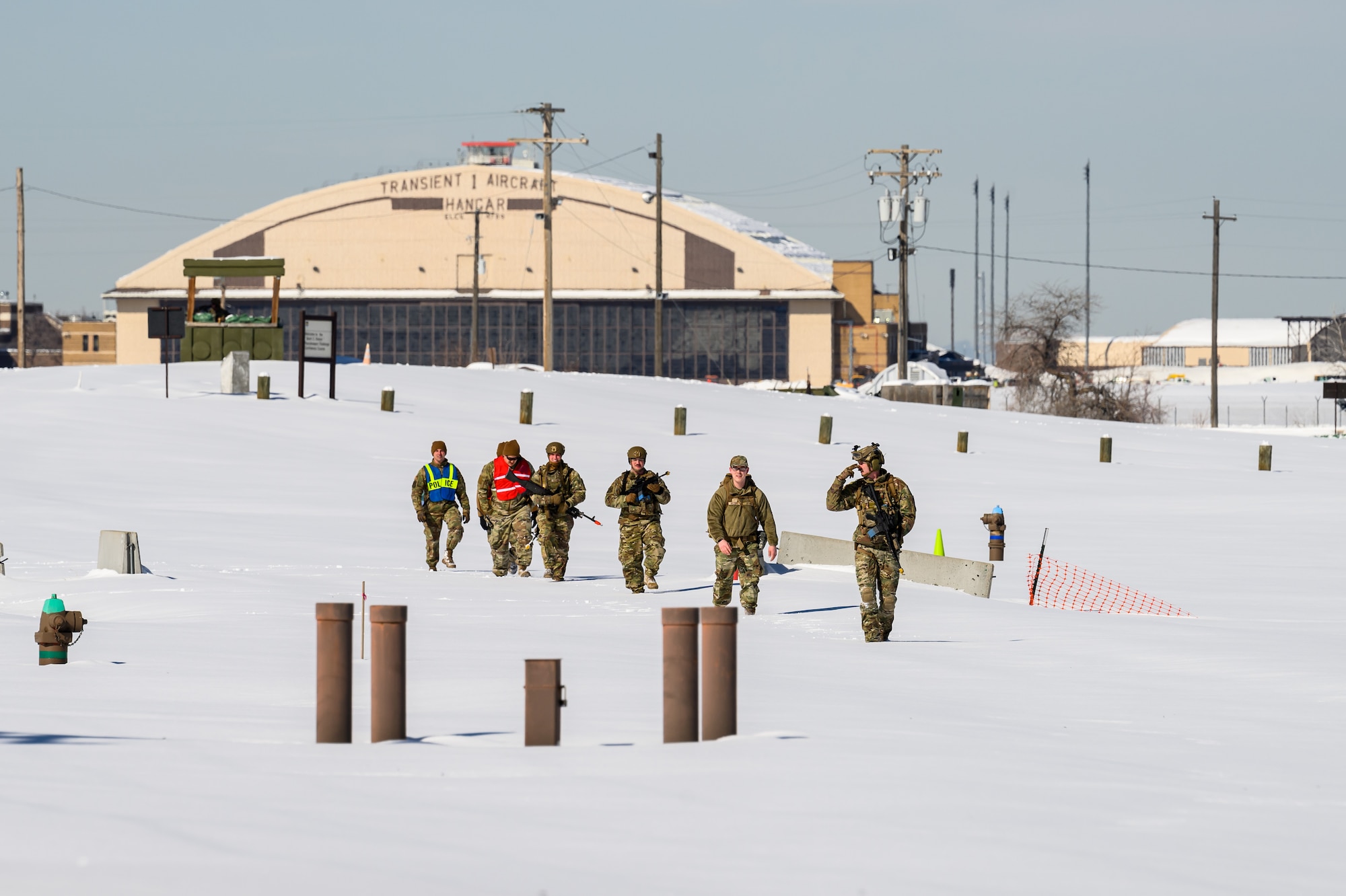 Defenders with the 75th Security Forces Squadron on foot patrol during a training exercise at Hill Air Force Base, Utah, March 28, 2023. The squadron conducted a series of near-peer adversary field training exercises in the Base Operations Readiness Area from March 18-28. (U.S. Air Force photo by R. Nial Bradshaw)