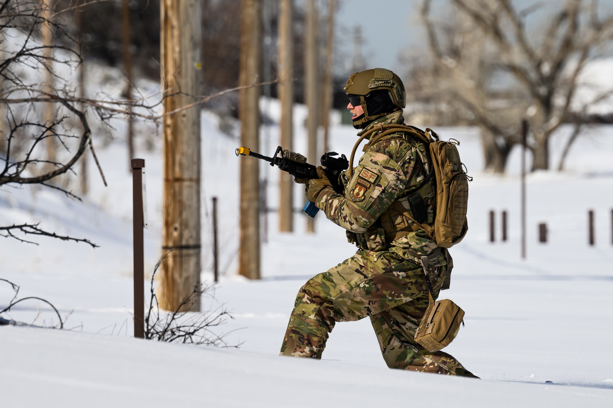 Staff Sgt. Timothy Bukovich, 75th Security Forces Squadron, searches for opposing forces during a training exercise at Hill Air Force Base, Utah, March 28, 2023. The squadron conducted a series of near-peer adversary field training exercises in the Base Operations Readiness Area from March 18-28. (U.S. Air Force photo by R. Nial Bradshaw)