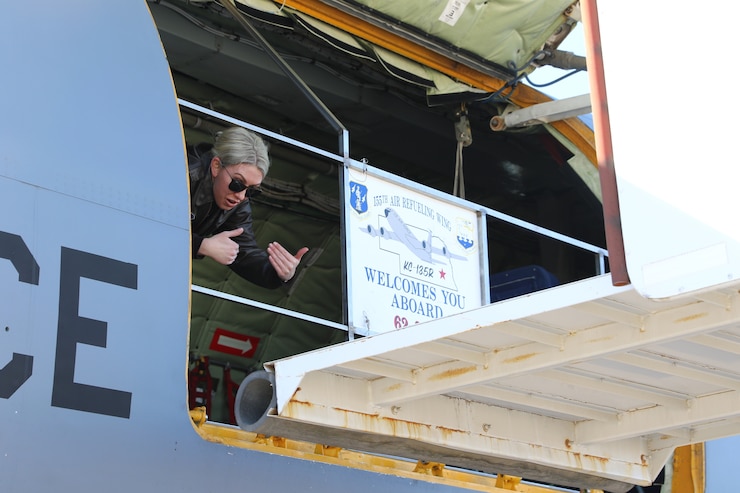 Staff Sgt. Audrey Levey, a boom operator serving with the Nebraska Air National Guard's 155th Air Refueling Wing, prepares a KC-135 Stratotanker for an orientation tour March 31, 2022, on the Air National Guard base at the Lincoln Airport.