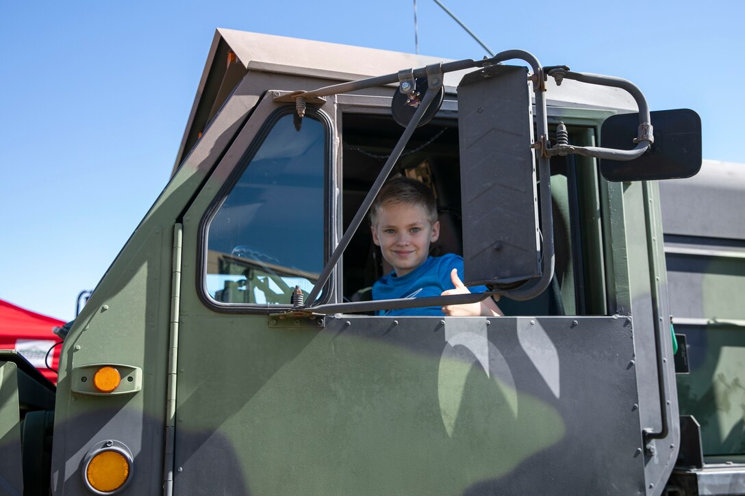 Soldiers with the Nebraska Army National Guard’s 67th Maneuver Enhancement Brigade headquarters attend the Star City BMX Military Appreciation Day in Lincoln, Nebraska, Sept. 11, 2022