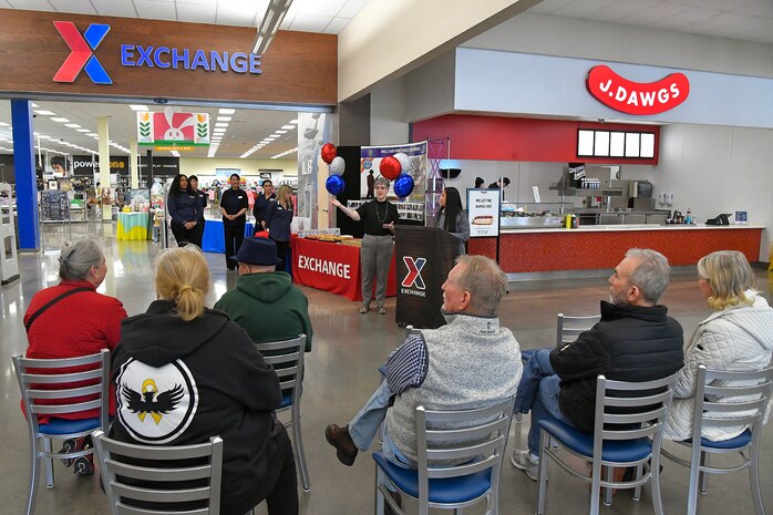 (Center)  Tammy Hairston, Utah AAFES Exchange general manager, welcomes Vietnam veterans and guests to a pinning ceremony March 29, 2023, at the AAFES Base Exchange at Hill Air Force Base, Utah. The ceremony was held to honor and remember Vietnam era veterans for National Vietnam Veterans Day. (U.S. Air Force photo by Todd Cromar)