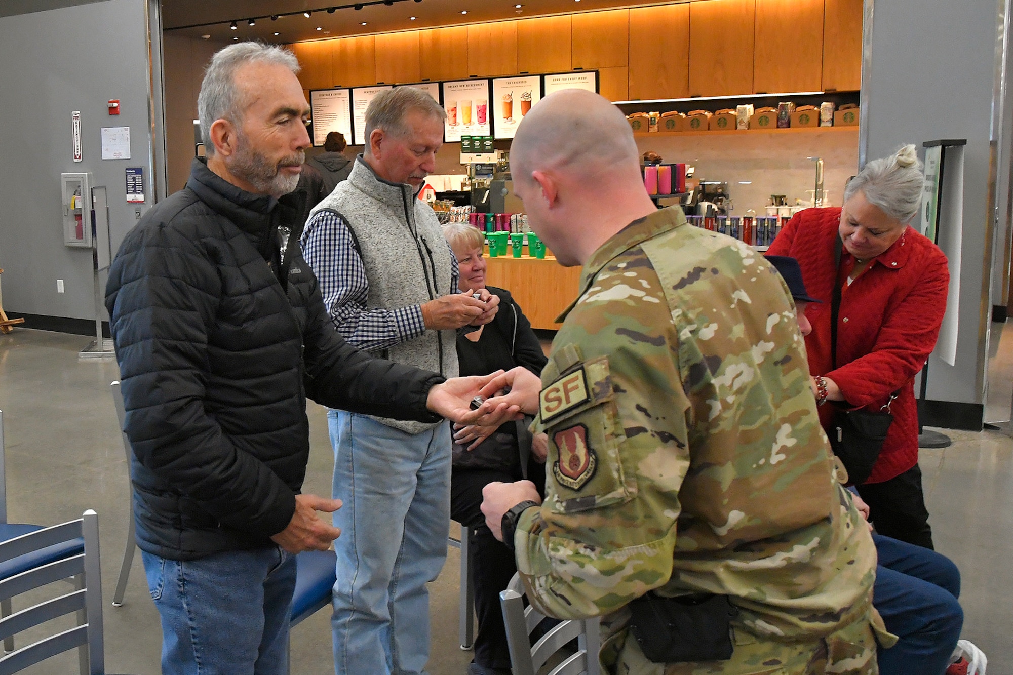 230329-F-LS255-0003 – (Left to right) Danny Earl, a Vietnam veteran who served in the Air Force, receives a commemorative lapel pin from Lt. Col. Paul Dinkins, 75th Security Forces Squadron commander, during a pinning ceremony March 29, 2023, at the AAFES Base Exchange at Hill Air Force Base, Utah. The ceremony was held to honor and remember Vietnam era veterans for National Vietnam Veterans Day. (U.S. Air Force photo by Todd Cromar)