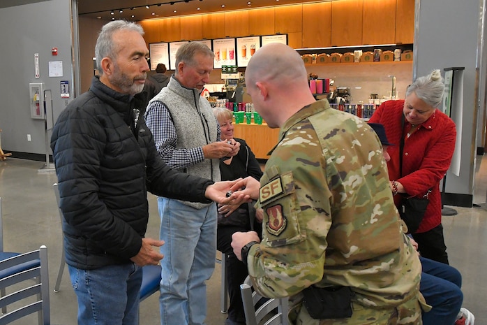 230329-F-LS255-0003 – (Left to right) Danny Earl, a Vietnam veteran who served in the Air Force, receives a commemorative lapel pin from Lt. Col. Paul Dinkins, 75th Security Forces Squadron commander, during a pinning ceremony March 29, 2023, at the AAFES Base Exchange at Hill Air Force Base, Utah. The ceremony was held to honor and remember Vietnam era veterans for National Vietnam Veterans Day. (U.S. Air Force photo by Todd Cromar)