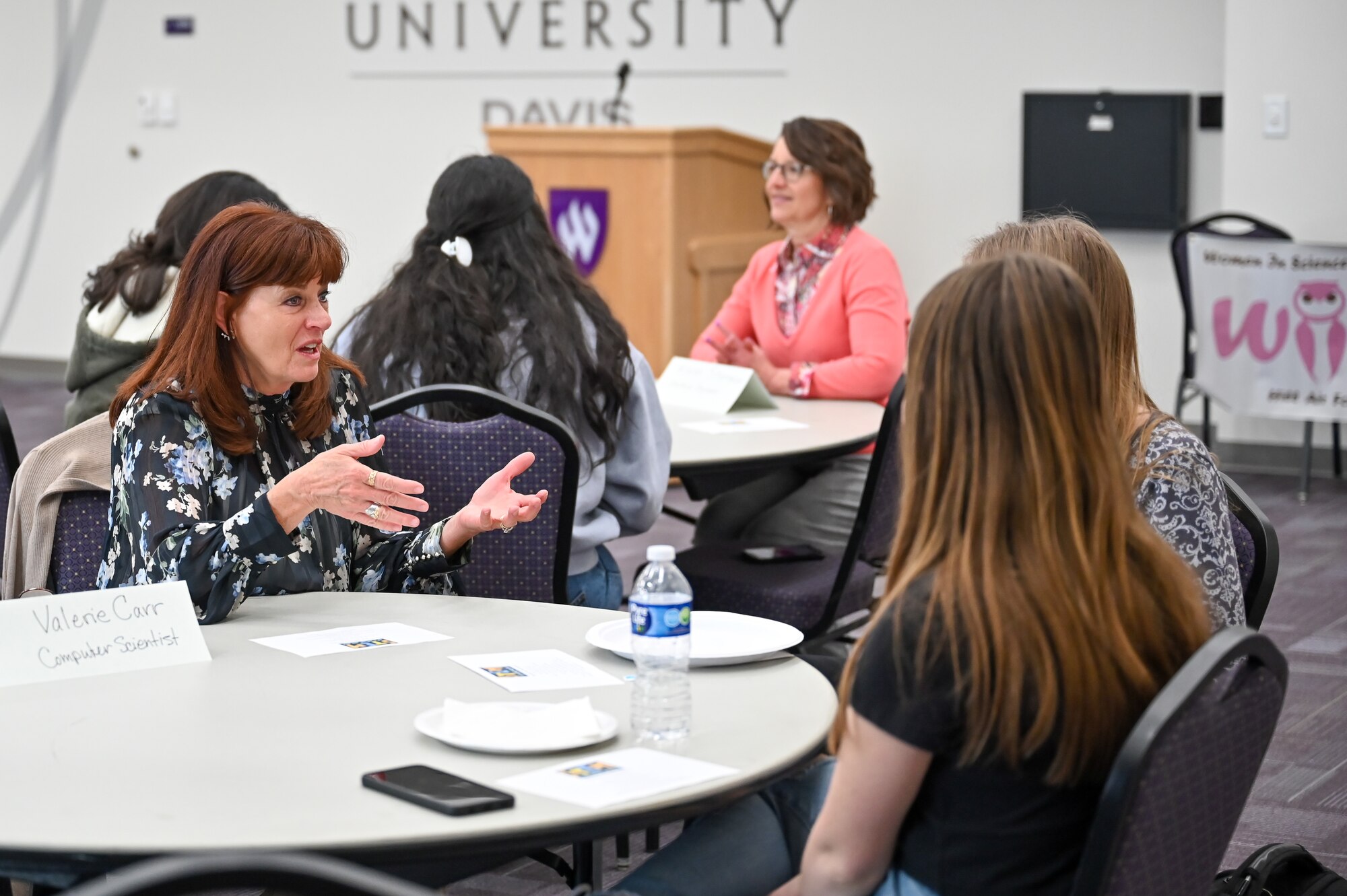 Valerie Carr, 520th Software Engineering Squadron at Hill Air Force Base, Utah, meets with female high school students from NUAMES High School in Layton, during a Science, Technology, Engineering and Math (STEM) event March 30, 2023.