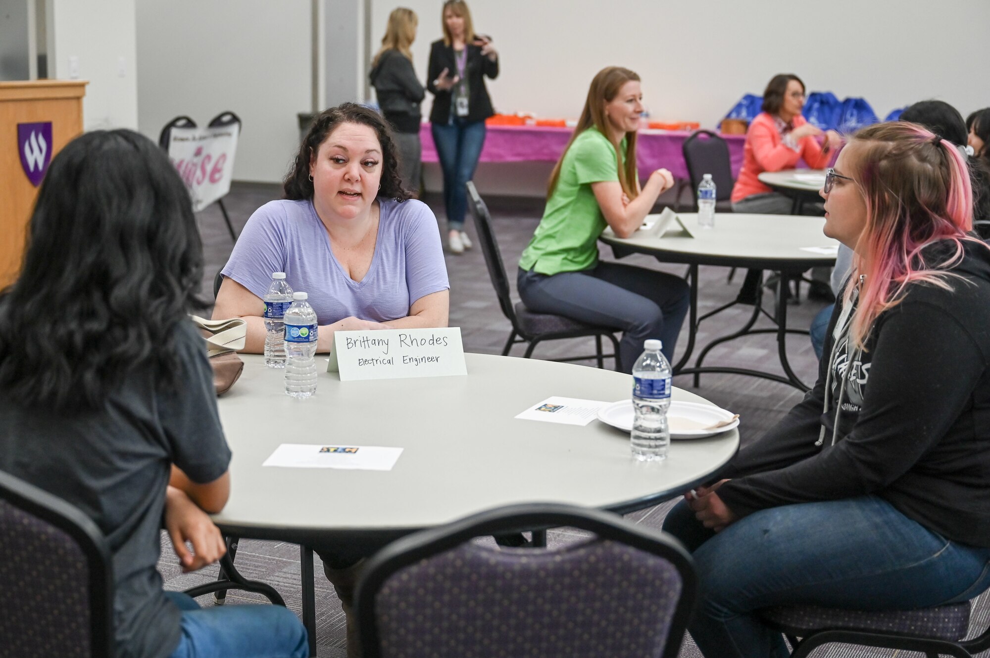 Brittany Rhodes, 516th Software Engineering Squadron at Hill Air Force Base, Utah, meets with female high school students from NUAMES High School in Layton, during a Science, Technology, Engineering and Math (STEM) event March 30, 2023.