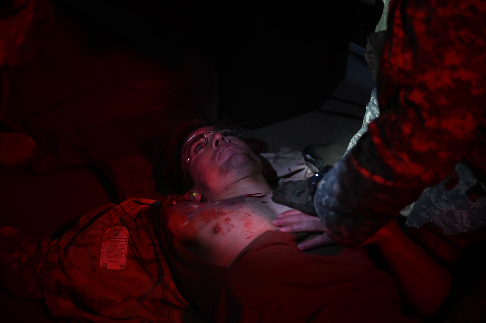 Airman performs CPR on patient