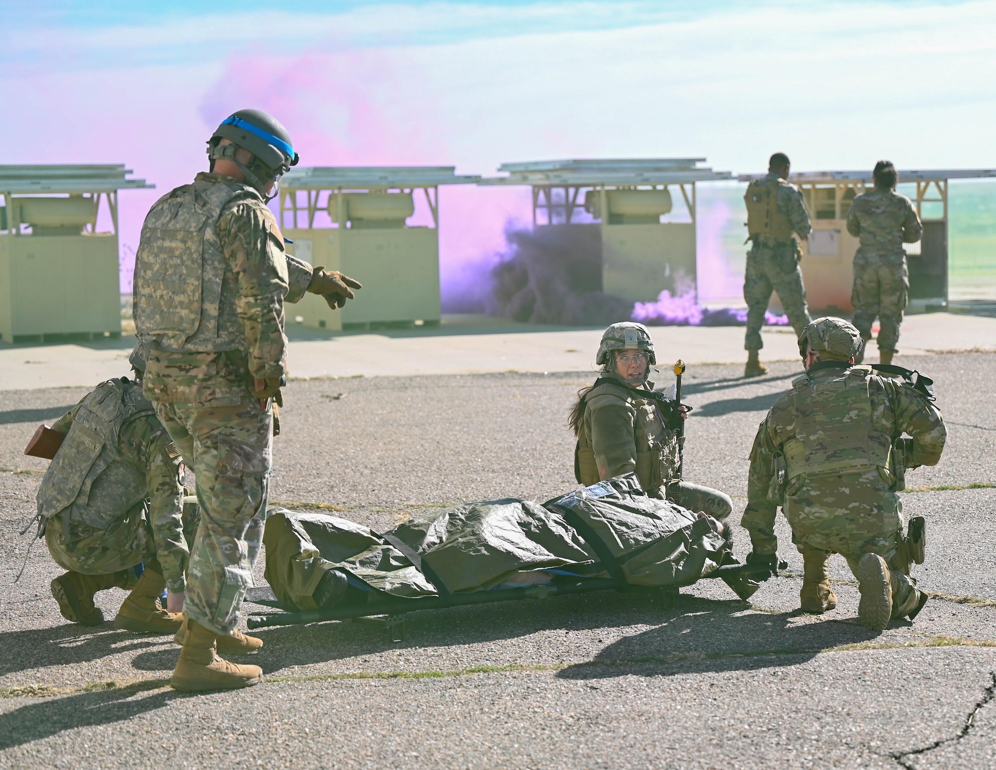 Airmen transport a patient