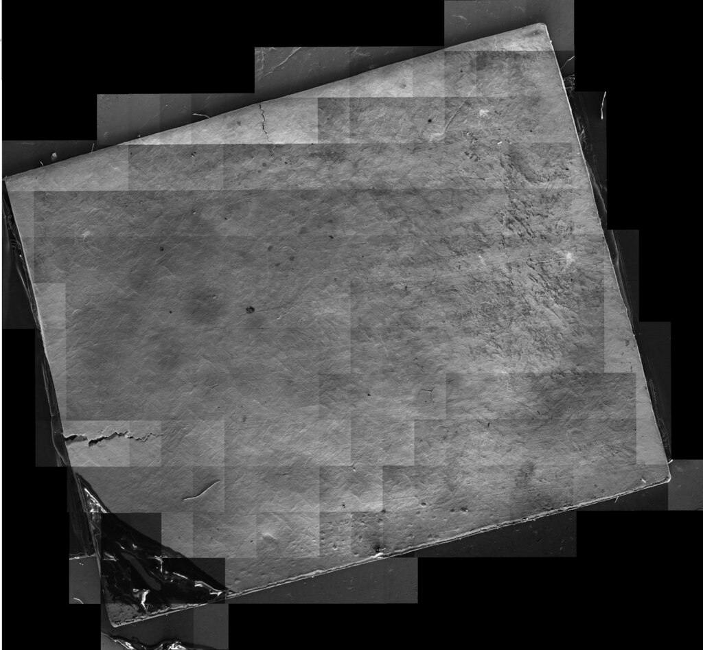A palladium bar after being exposed to lasers in a low-energy nuclear reaction experiment at the U.S. Army Engineer Research and Development Center’s Cold Regions Research and Engineering Laboratory in Hanover, New Hampshire. The image shows areas of silicon that were not present before the experiment. The image was taken with a scanning electron microscope at about a 1 µm resolution. The palladium bar was about a centimeter squared in area.