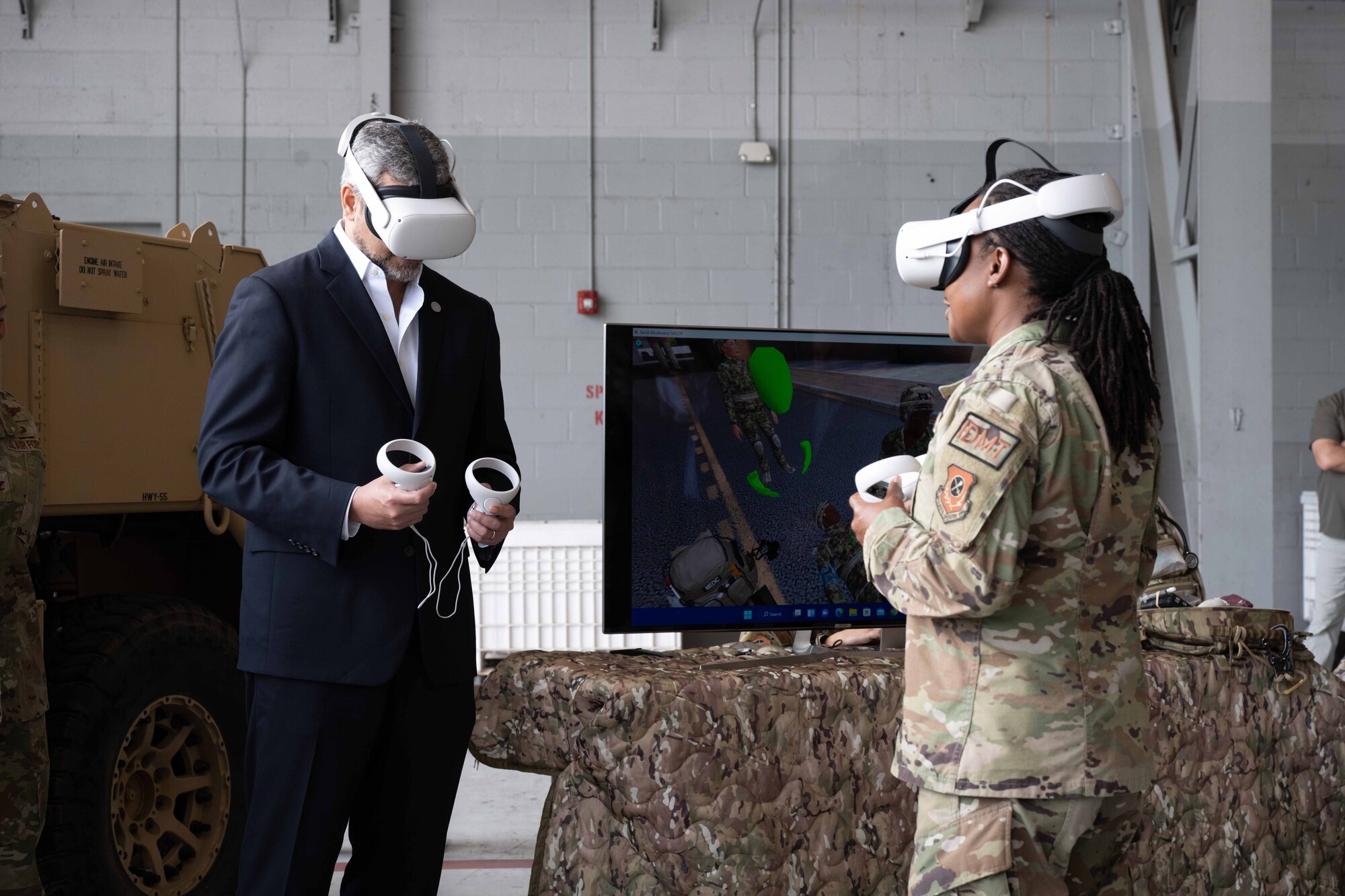 President Mario Abdo Benítez of the Republic of Paraguay uses a virtual reality headset with an AFSOC Independent Duty Medical Technician at Hurlburt Field, Fla., March 31, 2023.