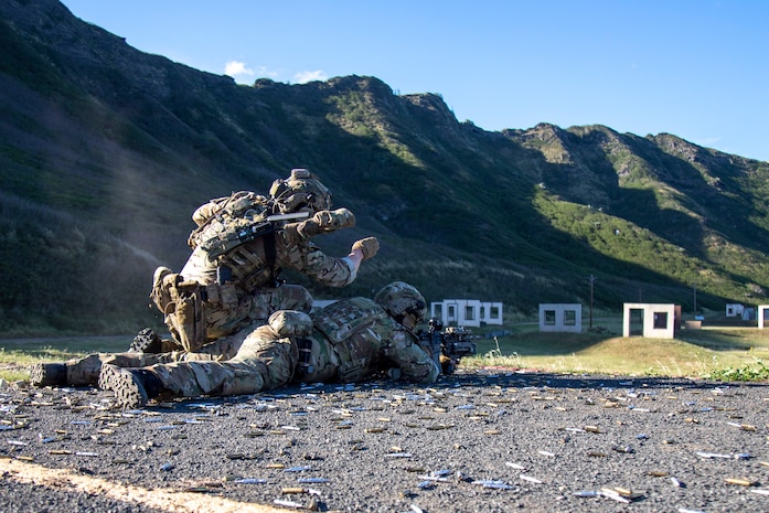 U.S. Army soldiers with Bravo Company, 75th Ranger Regiment, engage targets during a live fire exercise at Marine Corps Base Hawaii Range Training Facility, March 15, 2023. The 75th  Ranger Regiment was able to conduct jungle warfare training as well as knowledge sustainment through the use of MCBH’s unique training ranges. (U.S. Marine Corps Photos by Lance Cpl. Terry Stennett)