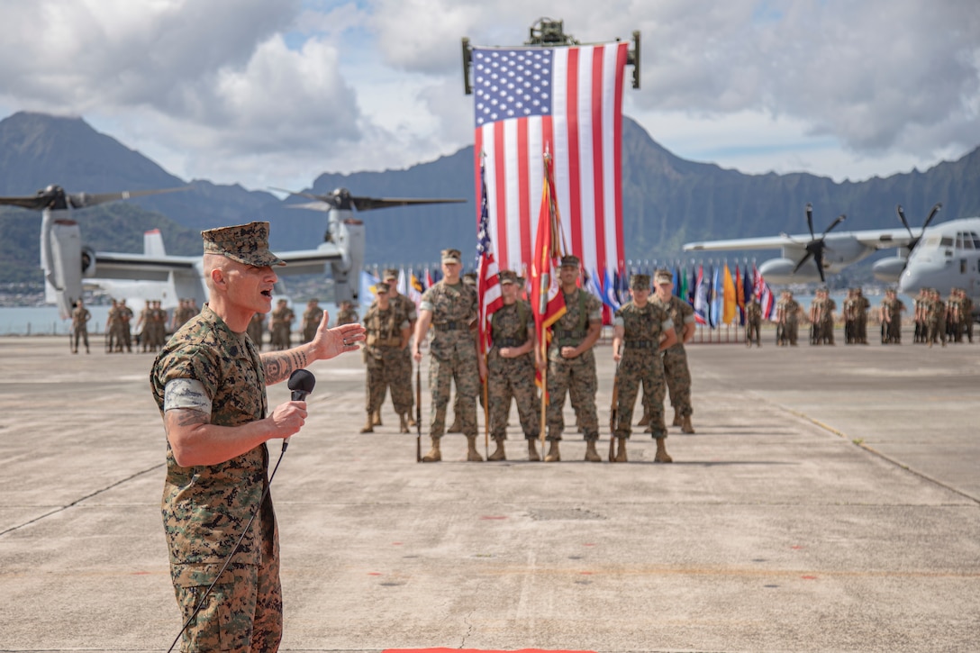 U.S. Marine Corps Sgt. Maj. Sael G. Garcia, sergeant major of Marine Aircraft Group 24, addresses guests during a post and relief ceremony for MAG-24, Marine Corps Air-Station Kaneohe Bay, Hawaii, March 17, 2023. Sgt. Maj. Henry R. French relieved Garcia of his duties as the sergeant major for MAG-24. (U.S. Marine Corps photo by Cpl. Holly Moore)