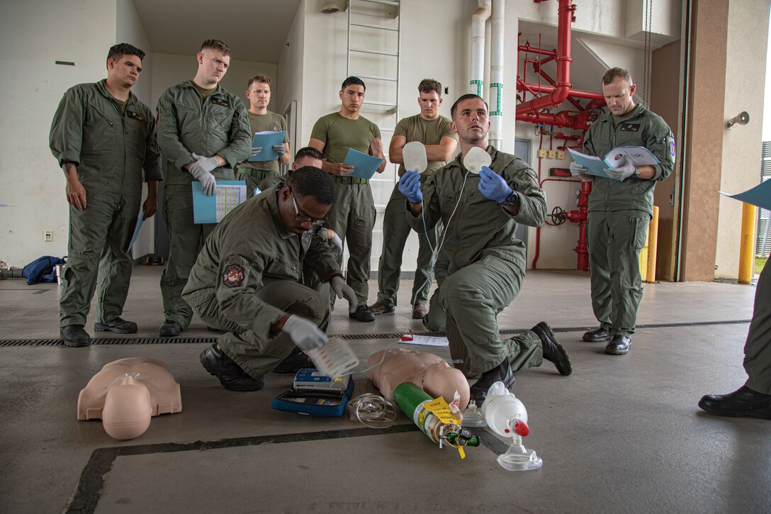U.S. Marine Corps Gunnery Sgt. David Waterfield, a training officer with Aircraft Rescue Firefighting, Marine Corps Air Station Kaneohe Bay, instructs students on medical response techniques during an emergency medical responder course, Marine Corps Base Hawaii, March 22, 2023. This is the first EMR course in the Marine Corps, and the MCAS ARFF is the first and only unit in the Marine Corps to be recognized by the National Registry of Emergency Technicians to create its own Emergency Medical Services program. (U.S. Marine Corps photo by Cpl. Holly Moore)