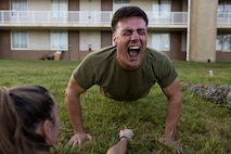 U.S. Marine Corps Sgt. Joseph Hess, an optics technician with Headquarters Company, 3d Marine Littoral Regiment, conducts push-ups during the 3d Reconnaissance Battalion Screening Team Hawaii Roadshow, Marine Corps Base Hawaii, March 23, 2023. The physical screening test evaluated, assessed and selected Marines potentially capable of earning the reconnaissance military occupational specialty. (U.S. Marine Corps photo by Cpl. Samantha Sanchez)