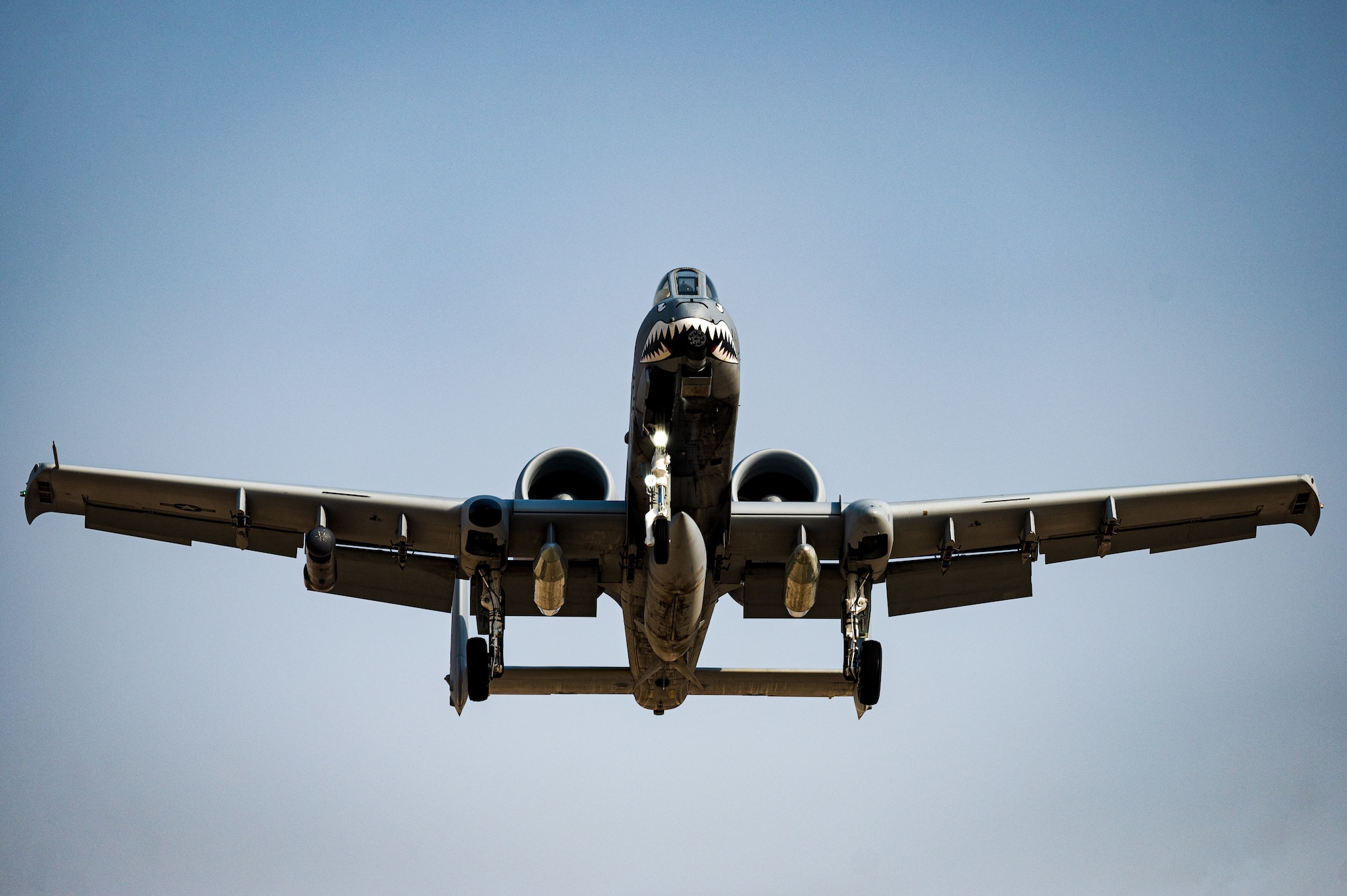 The first A-10 Thunderbolt II from the 75th Expeditionary Fighter Squadron approaches for landing at Al Dhafra Air Base, United Arab Emirates, March 31, 2023. The arrival of the 75th EFS and the 75th Expeditionary Fighter Generation Squadron will provide additional capabilities in close air support within the U.S. Central Command area of responsibility.  (U.S. Air Force photo by Staff Sgt. Sabatino DiMascio)