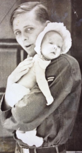 Pictured is Capt. Stephen A. Rusch holding his daughter, Sharon Rusch, now Maj. Gen. Sharon Bannister, director of medical operations in the Office of the Surgeon General, Arlington, Va. Rusch, a P4E Phantom pilot during the Vietnam War, was shot down in southern Laos and considered missing in action. His remains were identified in 2007, and was laid to rest in Arlington National Cemetery, Va. (Courtesy photo)