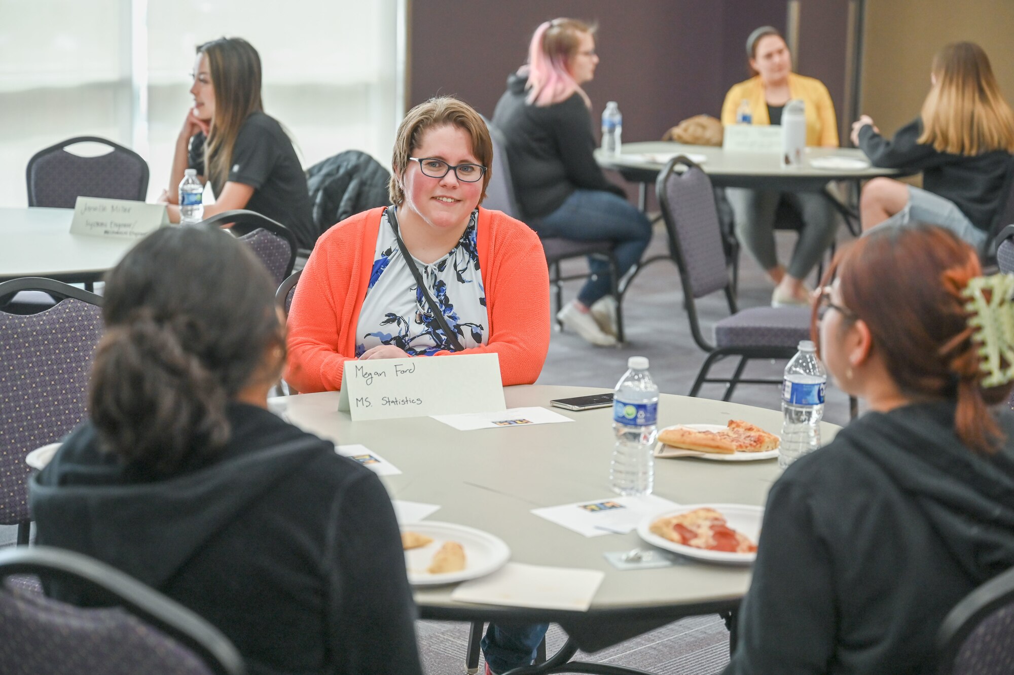 Megan Ford, 309th Software Engineering Group at Hill Air Force Base, Utah, meets with female high school students from NUAMES High School in Layton, during a Science, Technology, Engineering and Math (STEM) event March 30, 2023