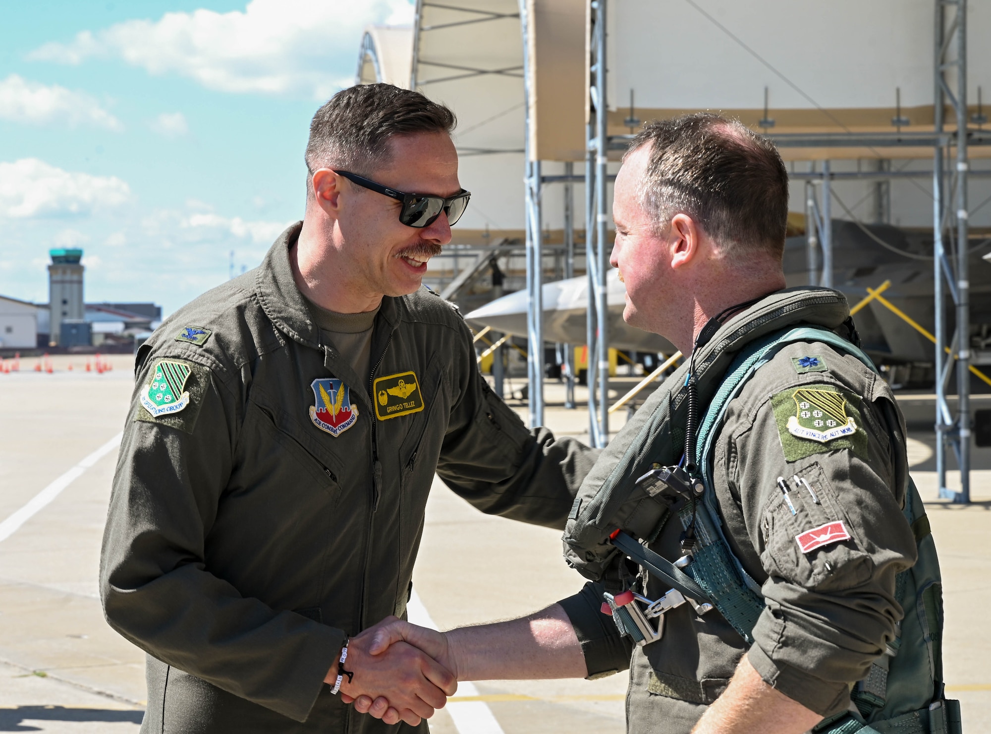 Col. Tellez greets Lt. Col. Evers