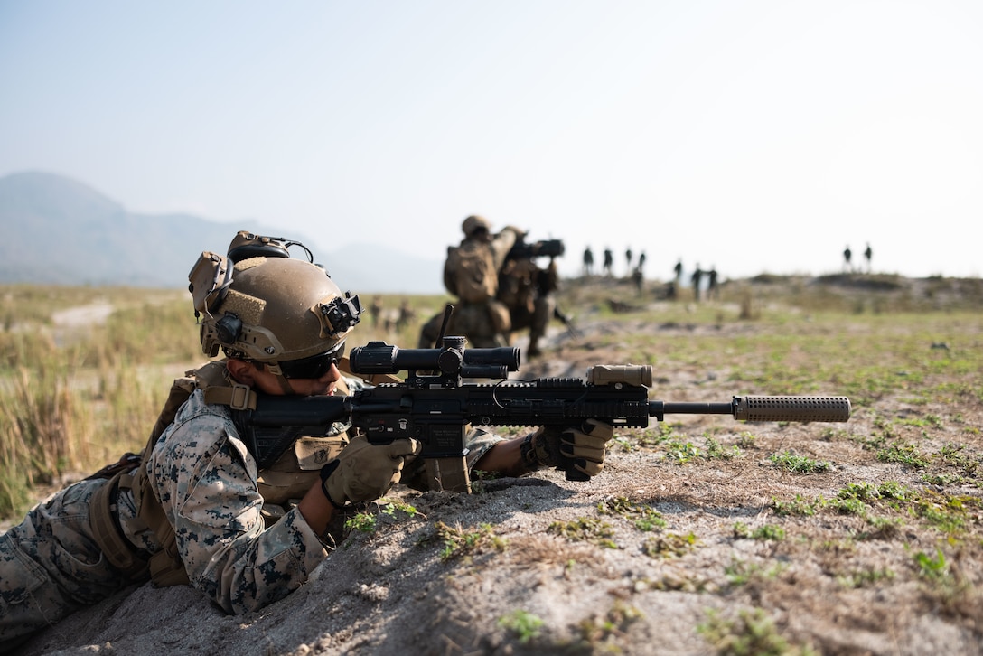 U.S. Marines, with 3d Littoral Combat Team, 3d Marine Littoral Regiment, 3d Marine Division, conduct squad attack drills alongside Philippine Marines during Balikatan 23 in Santa Juliana, Philippines, April 18, 2023. Balikatan 23 is the 38th iteration of the annual bilateral exercise between the Armed Forces of the Philippines and the U.S. military. The exercise includes three weeks of training focused on amphibious operations, command and control, humanitarian assistance, urban operations and counterterrorism skills throughout northern and western Luzon. Coastal defense training figures prominently in the Balikatan 23 training schedule.