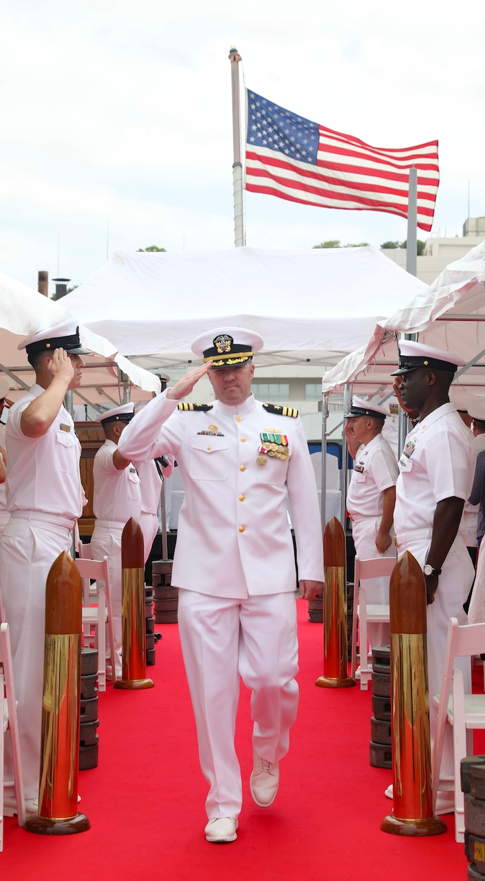 Cmdr. Matthew Hays walks through side boys following a change-of-command ceremony aboard the Arleigh Burke-class guided missile destroyer USS Milius (DDG 69). During the ceremony, Hays was relieved as Milius’ commanding officer by Cmdr. Leif Gunderson. Milius is assigned to Commander, Task Force 71/Destroyer Squadron (DESRON) 15, the Navy’s largest forward-deployed DESRON and the U.S. 7th Fleet’s principal surface force.