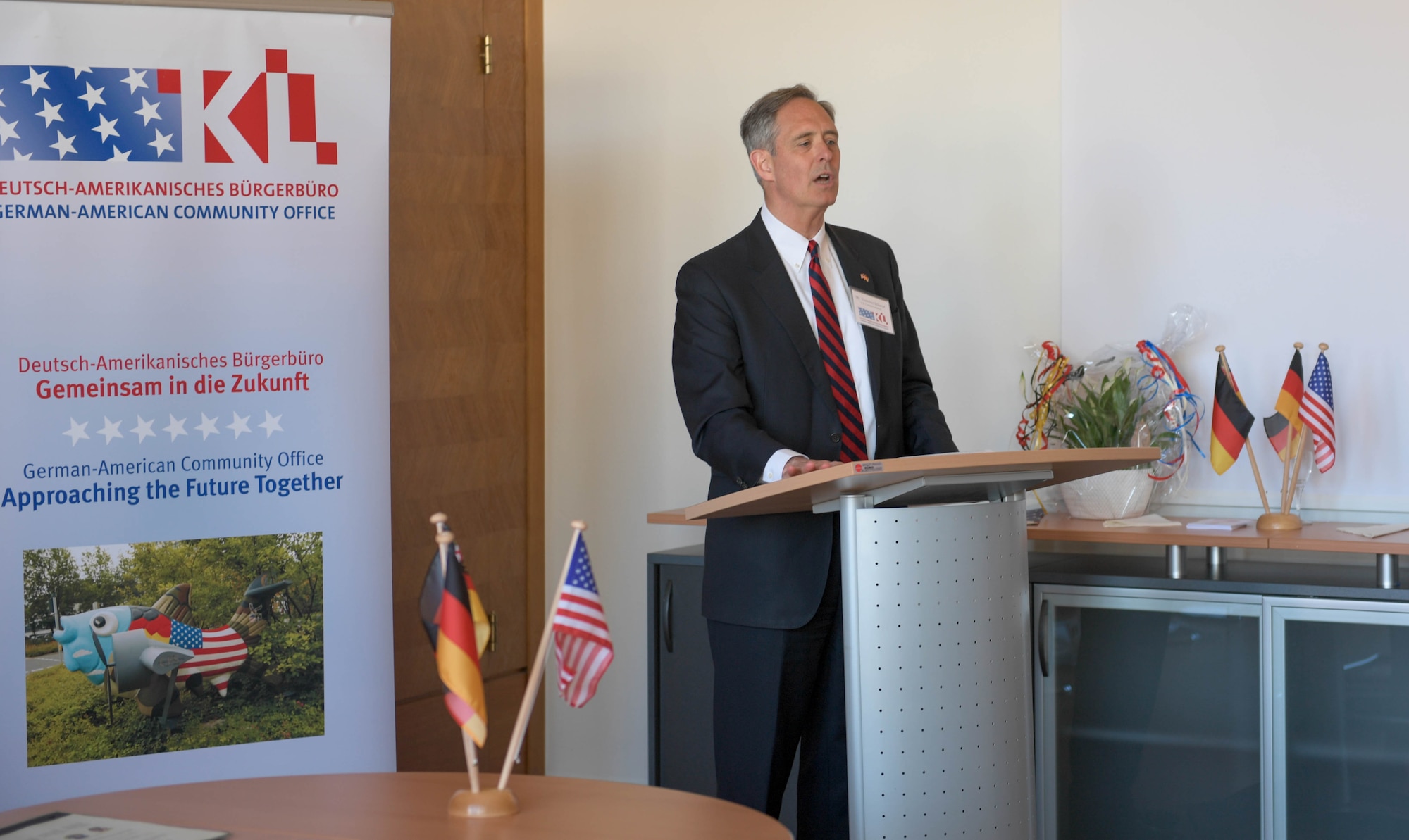 Norman Thatcher Scharpf, principal officer and consul general of the U.S. Consulate General in Frankfurt, Germany, congratulated members of the German American Community Office during the GACO 20th anniversary event in Kaiserslautern, Germany, April 21, 2023. The GACO was established in February 2003 to assist in the integration of American service members and their families in local German communities.