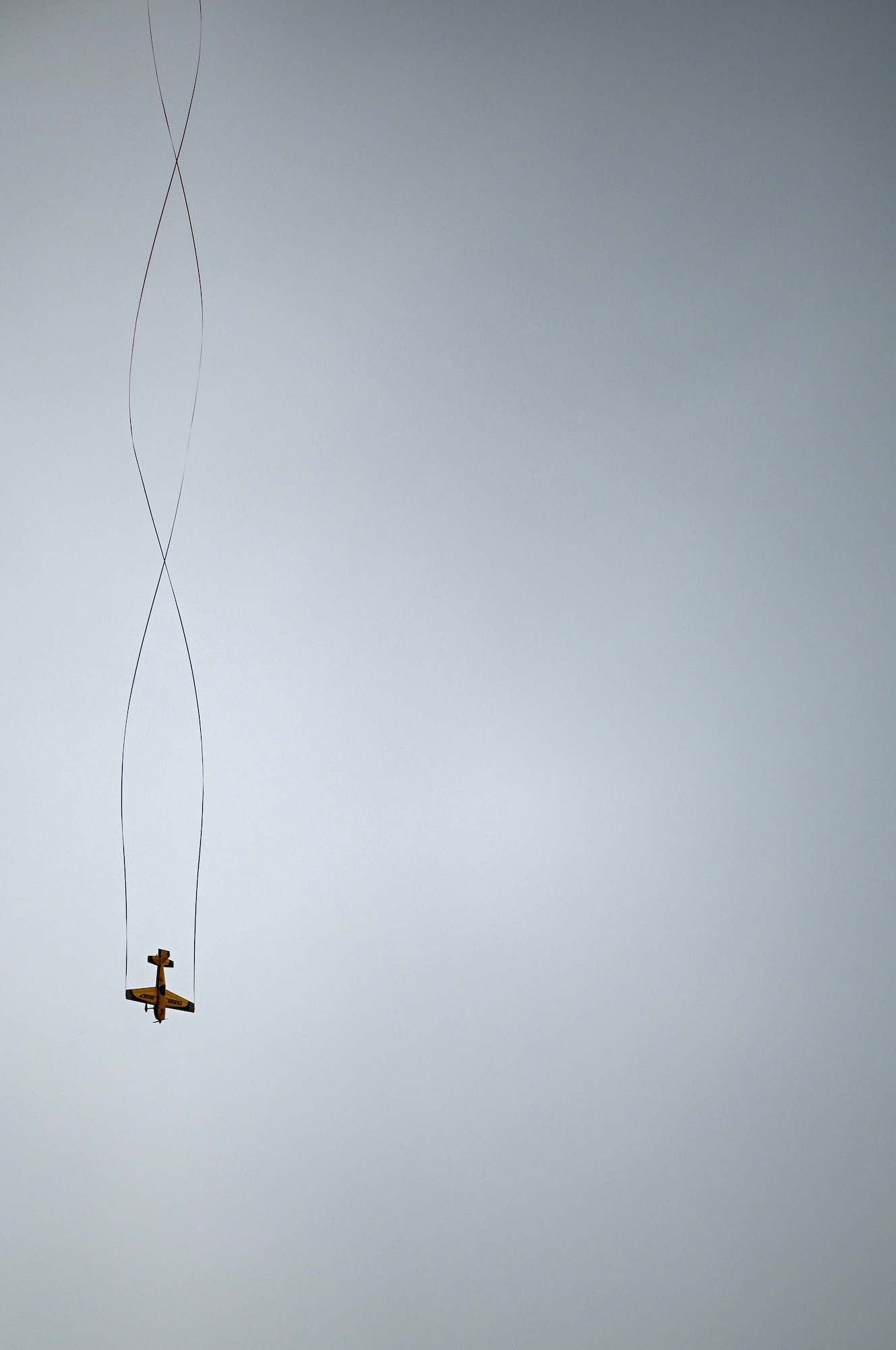 A Radio Controlled Plane performs an aerial dive during the 2023 Thunder Over the Sound Air and Space Show at Keesler Air Force Base, Mississippi, April 29, 2023.