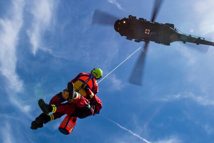 The Idaho Army National Guard's State Aviation Group and the Boise Fire Department’s Swiftwater/Dive Team conducted joint hoist rescue training April 26 and 28, 2023, at Gowen Field in Boise. The training enables the rescue team to become familiar with an aircraft's hoist while wearing river rescue gear.