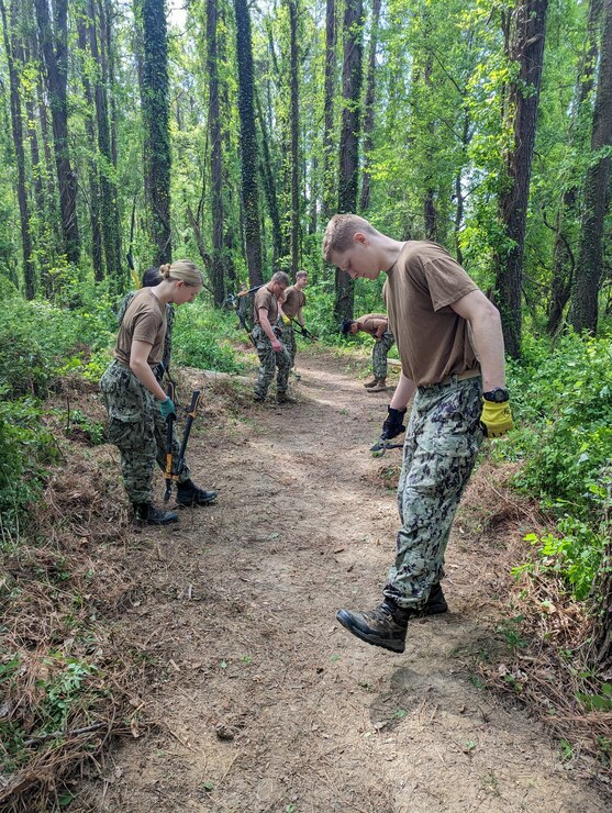 Midshipman from the U.S. Naval Academy participated in an environmental cleanup at Greenbury Point in commemoration of Earth Day.