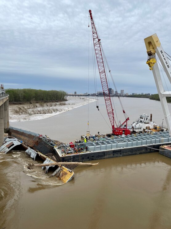 Salvage crews perform lightering operation