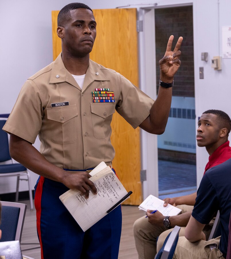 U.S. Marine Corps Lt. Col. Courtney Boston, executive officer, Officer Candidates School, shares his personal insights into good leadership techniques with attendees of the Marine Corps Leadership Seminar at Howard University in Washington, D.C., on April 21, 2023. MCLS develops greater connectedness between the Marine Corps and the local university community to attract top talent for Marine Corps officer (and enlisted) programs. (U.S. Marine Corps photo by Cpl. Levi Voss)